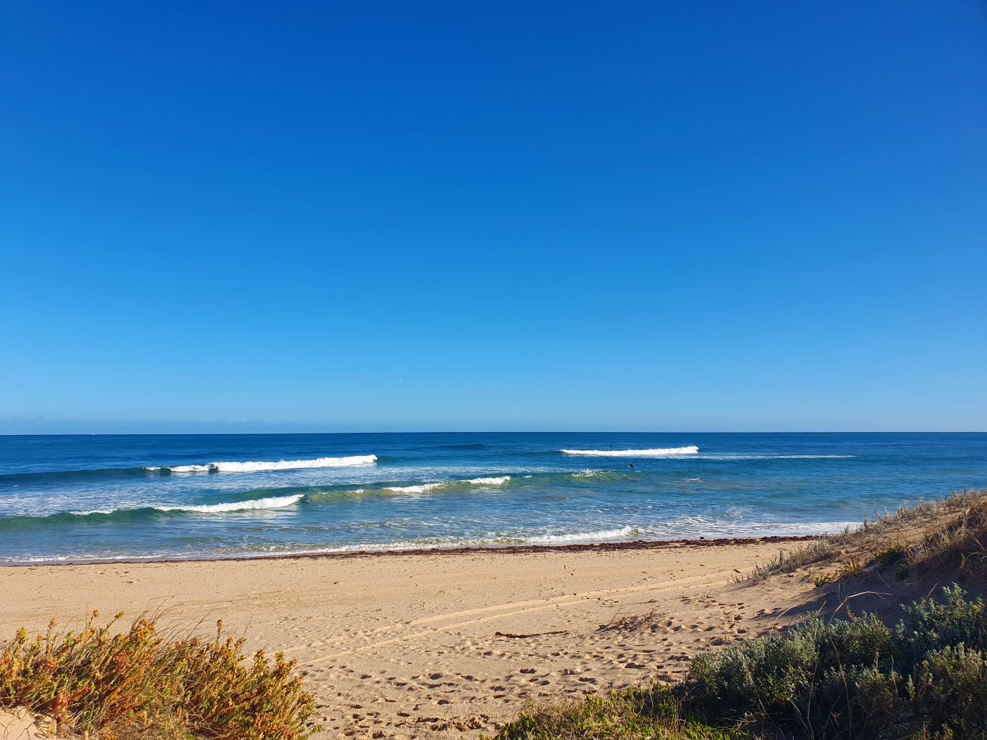 Surfing at Melros Beach